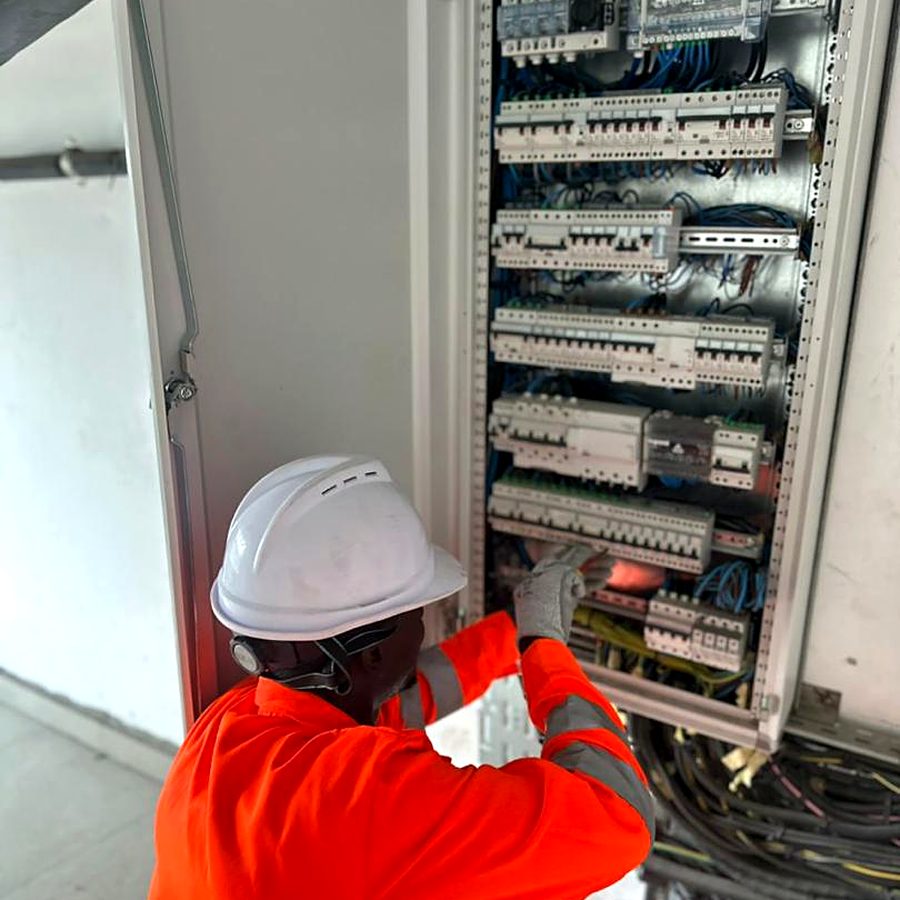 GastroClima technician working on an electrical distribution panel
