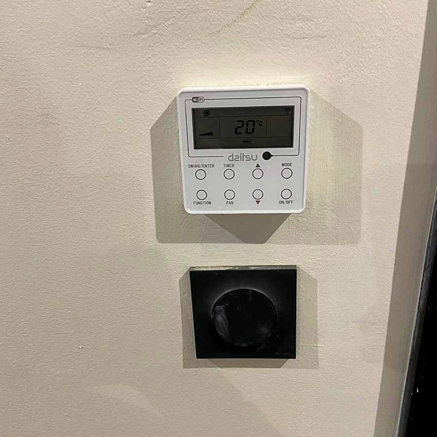 Wall-mounted air conditioning controller after commissioning